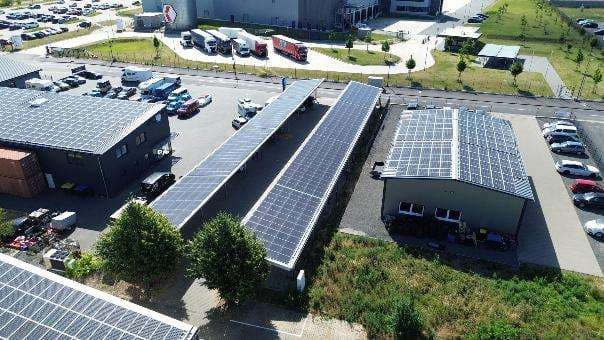 Sonstiges, unbebautes Grundstück, sowie ein Grundstück mit zwei Parkplatzüberdachungen - Bild 1