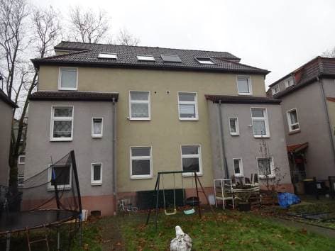 1/2 Anteil am Grundstück mit Dreifamilienhaus bebaut - Bild 1