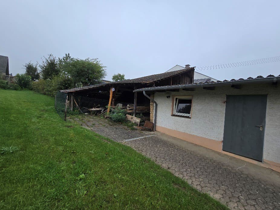 unbebautes Grundstück, unbebautes Grundstück, Kfz-Stellplatz, Einfamilienhaus - Bild 1